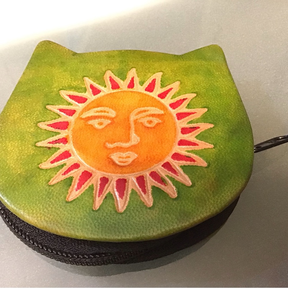 Sun Face Green and Orange Hand Tooled Leather Coin Purse 3” * 3” * 1”.